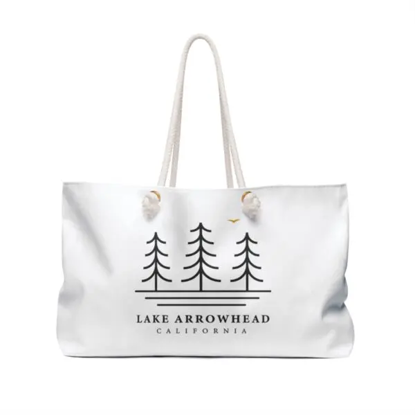 lake arrowhead weekender tote bag with three tree and water line art