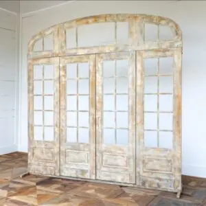 metal french door with top and side facade