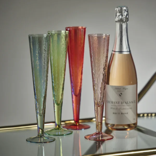 aperitivo slim champagne flute glass in a variety of colors by zodax on a tray