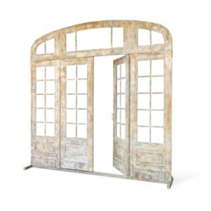 metal french door with top and side facade